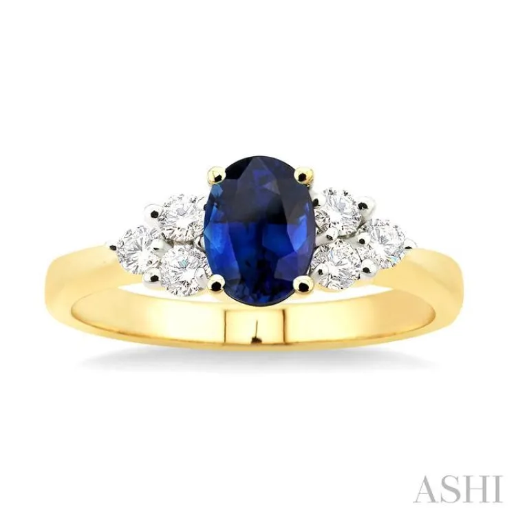 7x5mm Oval Cut Sapphire and 1/3 Ctw Round Cut Diamond Ring in 14K Yellow Gold